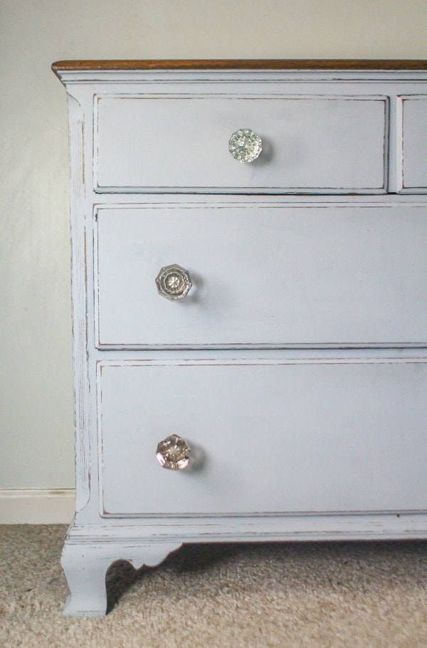 dresser with glass doorknobs