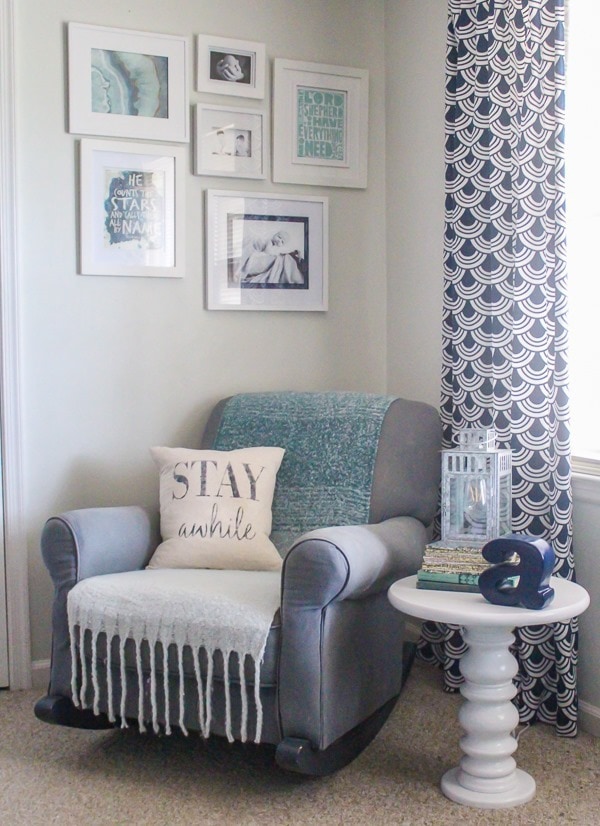 Gray rocking chair in gender neutral nursery. A little boho, a little traditional, and a touch of farmhouse.
