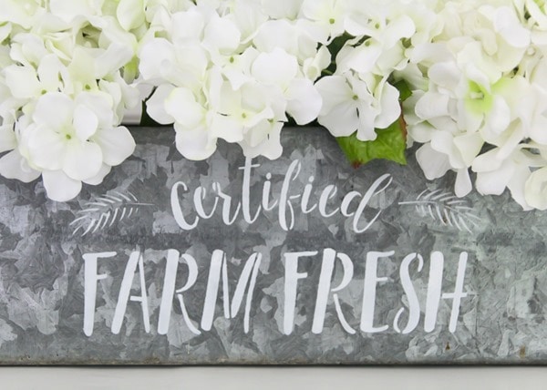 certified farm fresh stencil on galvanized metal.