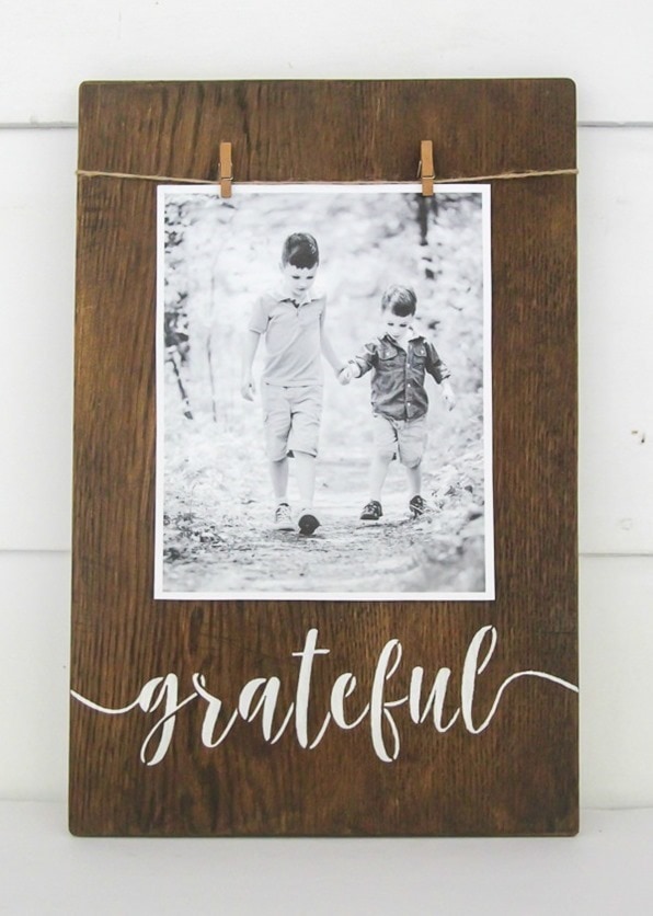 Easy stenciled photo display with grateful sign.