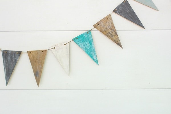 This easy diy wood banner is the perfect way to add farmhouse style to your home or wedding. 