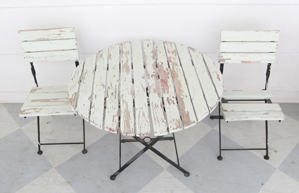 outdoor furniture with peeling paint