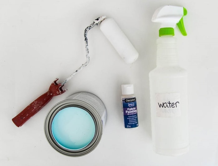 materials for painting outdoor cushions - paint roller, paint, fabric medium, spray bottle of water