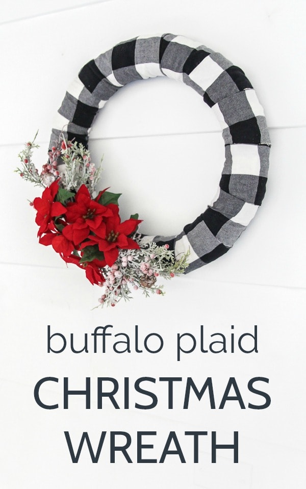 DIY buffalo plaid Christmas wreath with red poinsettias.