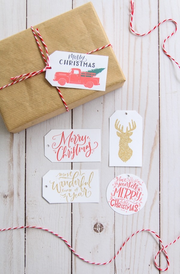 free printable gift tags with a present wrapped in brown paper.