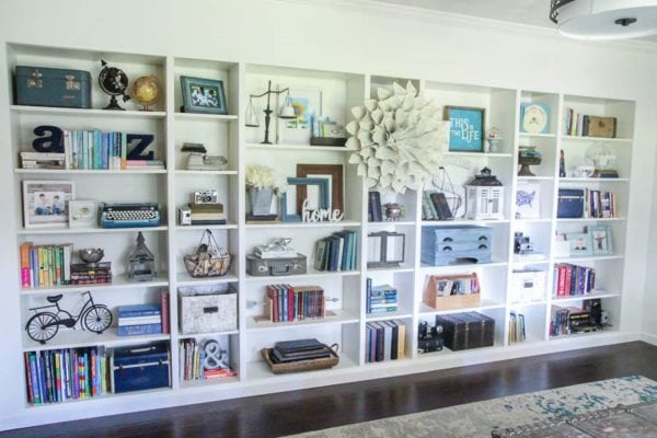 wall of build-in IKEA billy bookcases.