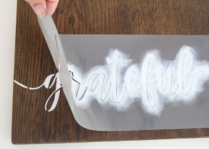 pulling back the stencil