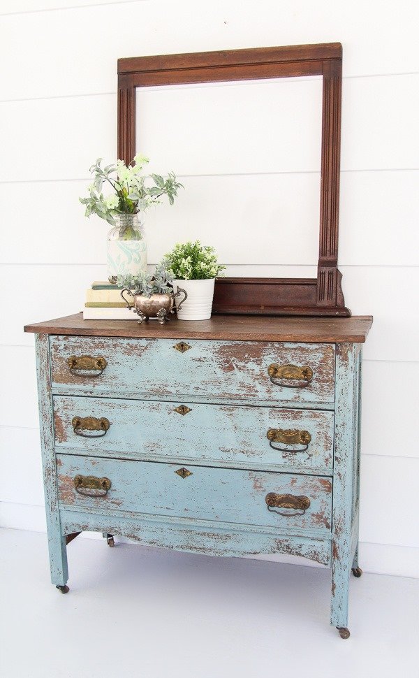 Blue farmhouse dresser makeover. This chippy paint looks so authentic and is easy to diy with milk paint.