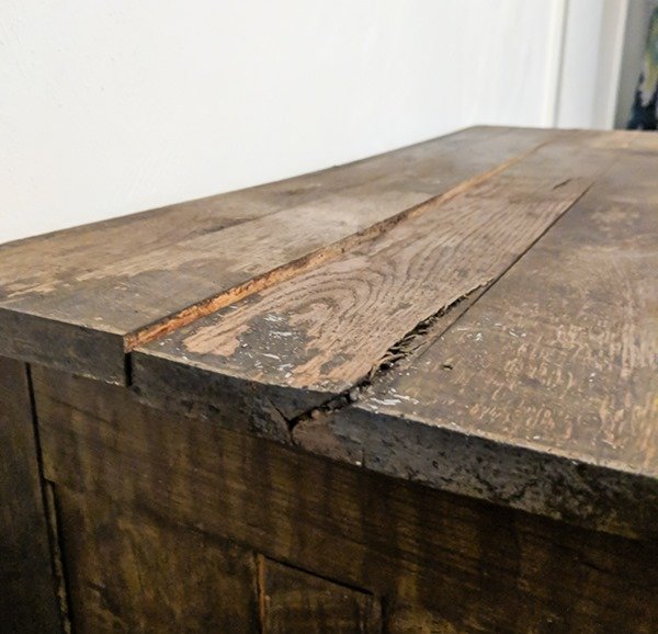 damaged dresser top