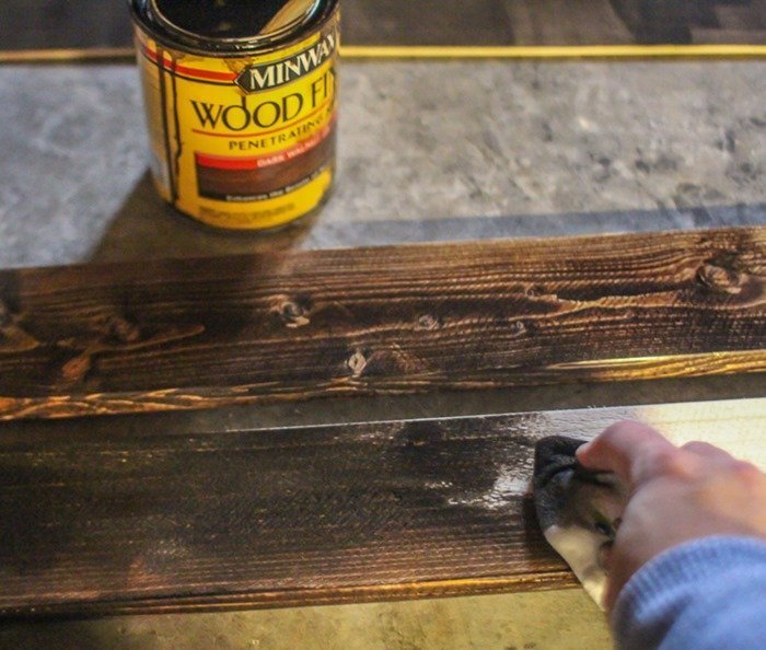 staining the wood frame for a diy chalkboard