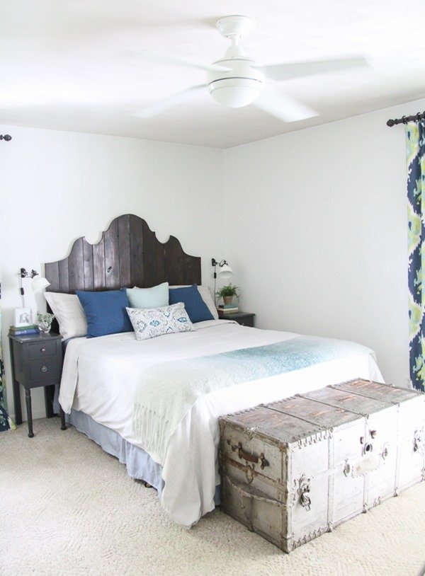 Cozy master bedroom with touches of bohemian and farmhouse style. 