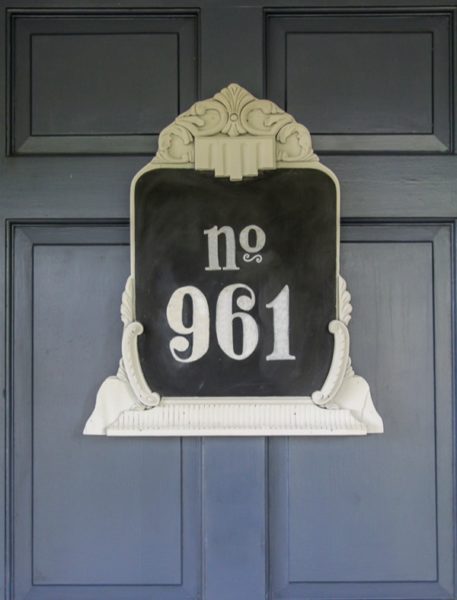 house number made from an old picture frame turned into a chalkboard