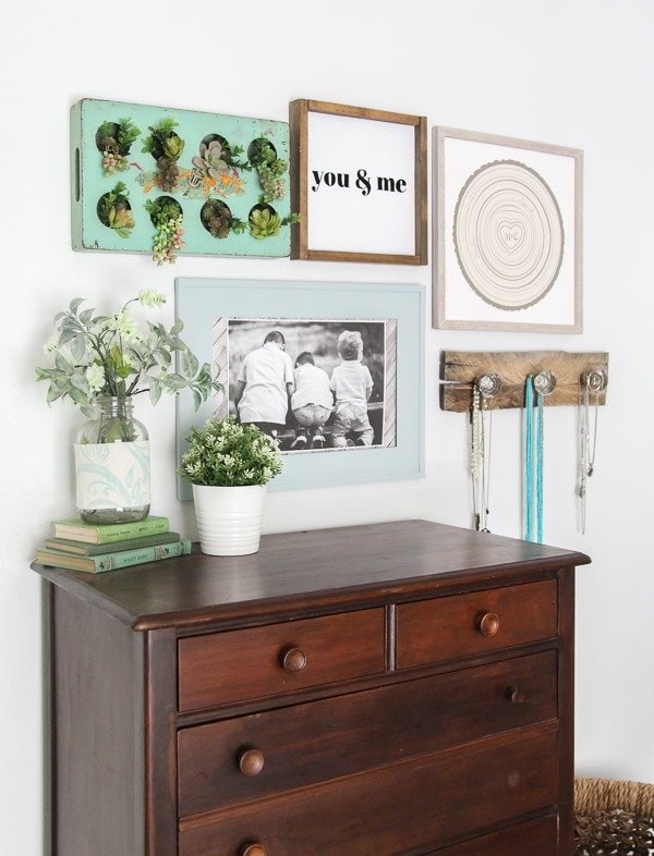 Eclectic gallery wall full of texture and charm. The perfect touch for a bohemian farmhouse space.