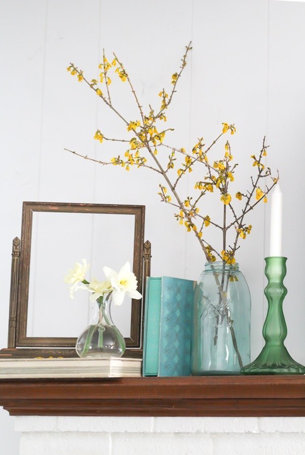 Decorating with nature on a spring mantel