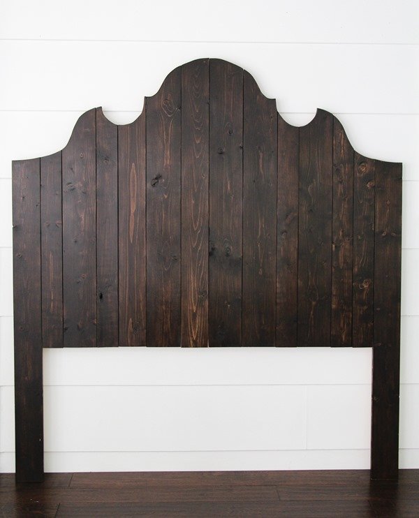 Learn how to make an easy DIY wooden headboard using inexpensive wood planks.