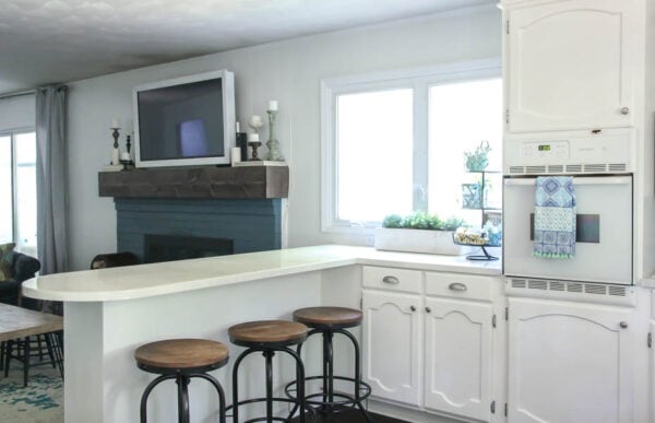 Blue and white modern farmhouse kitchen and family room on a budget.