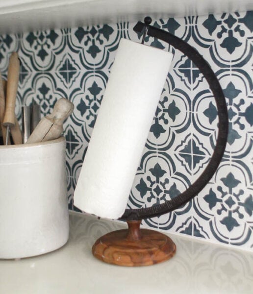 The perfect upcycled paper towel holder - made from an old globe stand.