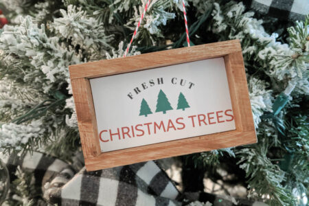 small wooden sign Christmas ornament that says fresh cut Christmas trees.