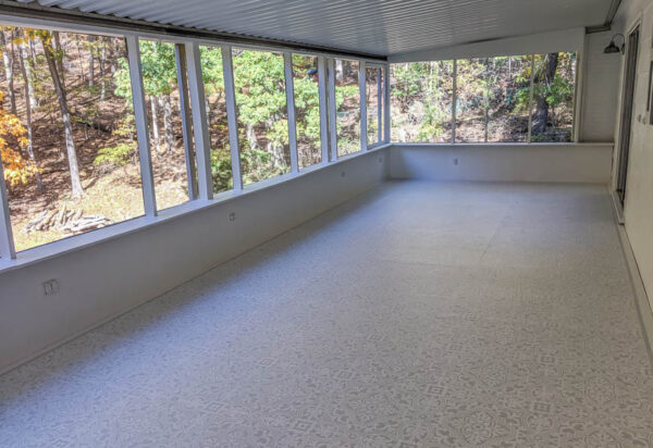 stenciled floor in screened-in porch