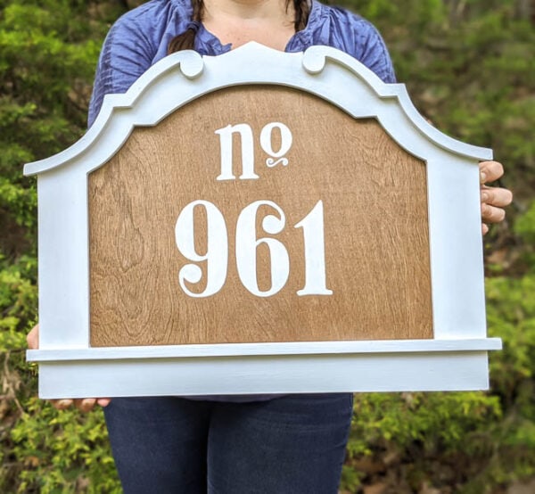 diy house number made from an old frame, plywood, and stenciled numbers