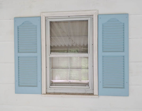 aluminum windows with blue shutters