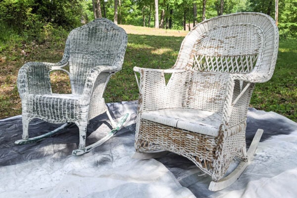 2 wicker rocking chairs once the peeling paint has been removed