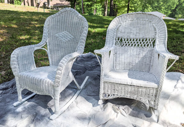 2 wicker rocking chairs after the second coat of white paint