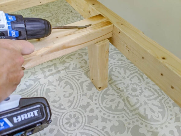 attaching slats to the daybed with pocket holes.