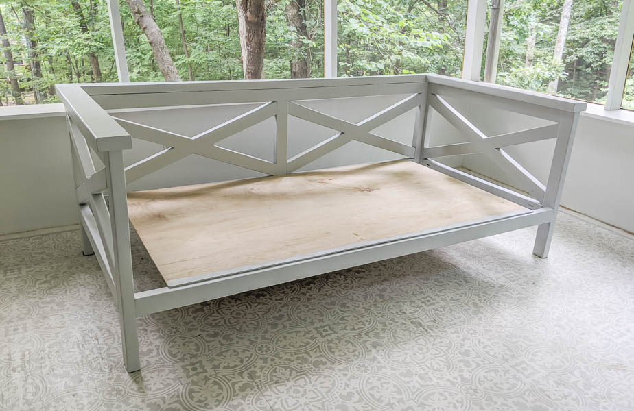 Finished diy daybed with plywood platform for mattress.