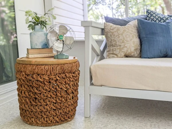 simple basket table made from a basket and a circular piece of wood