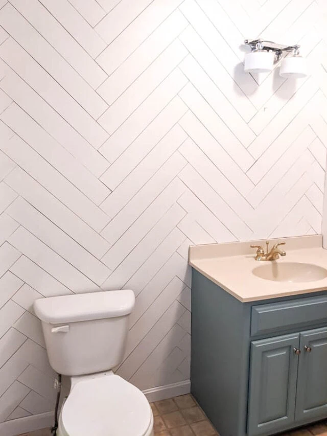 DIY herringbone wood wall in bathroom