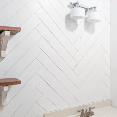 How to DIY a Herringbone Wood Wall on a Budget