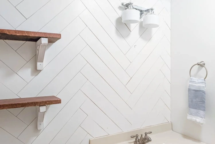 How to DIY a Herringbone Wood Wall on a Budget