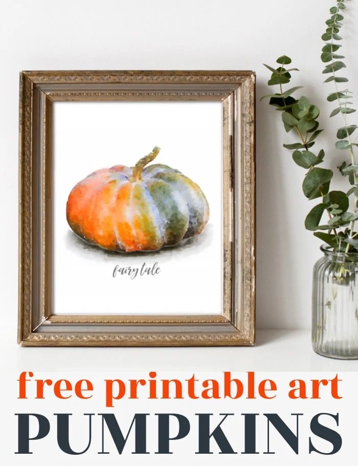 watercolor orange and green fairy tale pumpkin art print in a gold frame.