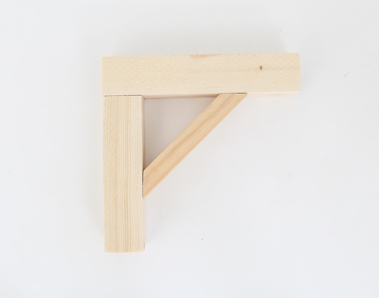 How to Make Cheap and Easy DIY Shelf Brackets