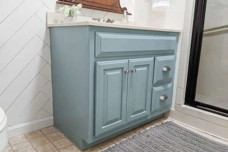 bathroom vanity painted light blue using General Finishes milk paint in Persian Blue