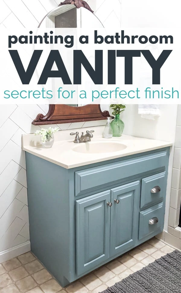 wood bathroom vanity painted with General Finishes persian blue with brushed nickle hardware