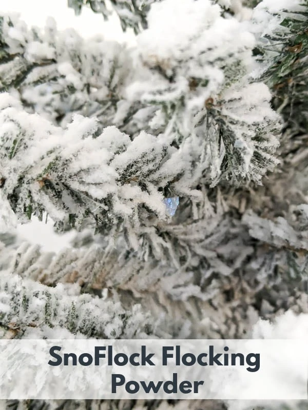 Close up of the snowy texture of a Christmas tree flocked with SnoFlock Flocking Powder.