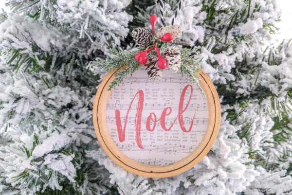 diy embroidery hoop ornament with the music from the first noel.