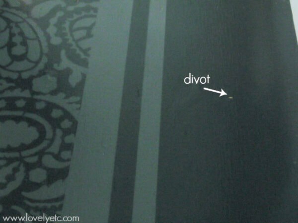 Small divot in painted plywood floor divot in painted plywood floor