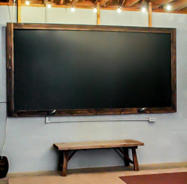 oversized DIY chalkboard with rustic frame.