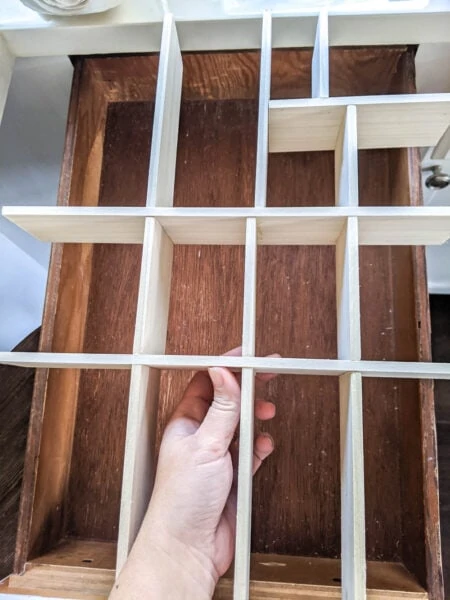 Removable drawer dividers easily slide in and out of the drawer.