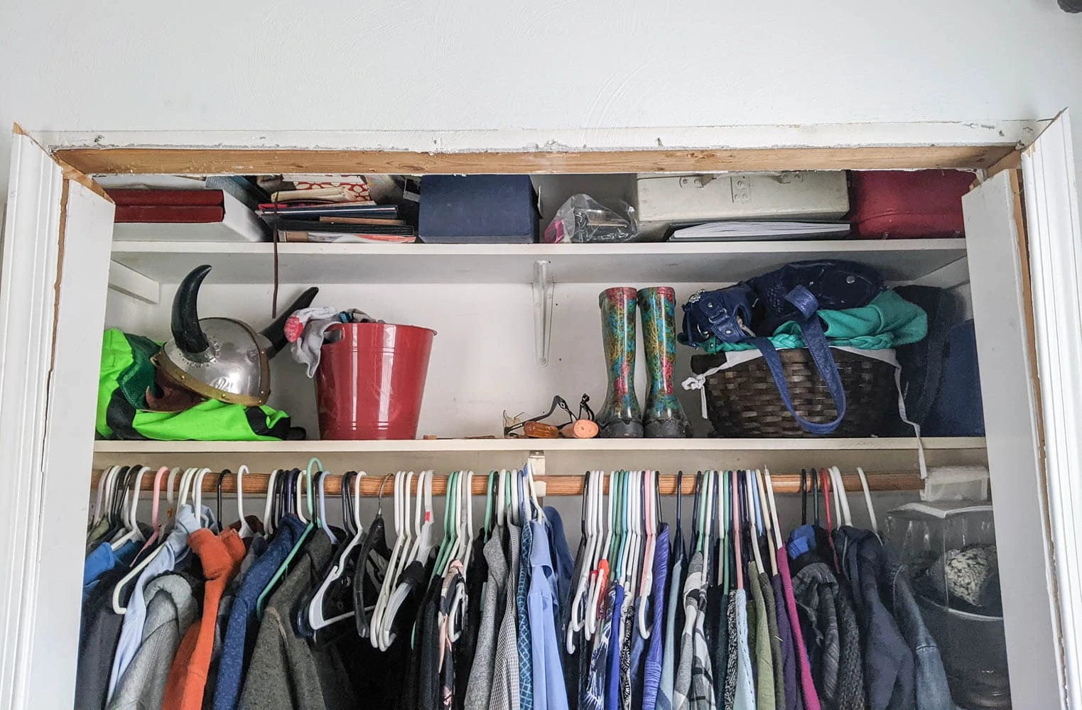 closet door frame with top sliding door track removed
