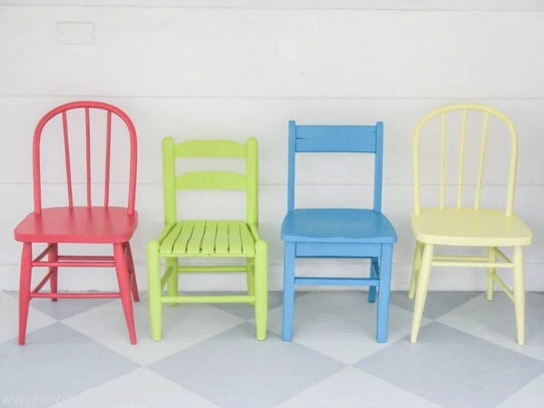 vintage kids chairs painted hot pink, blue, lime green, and yellow.