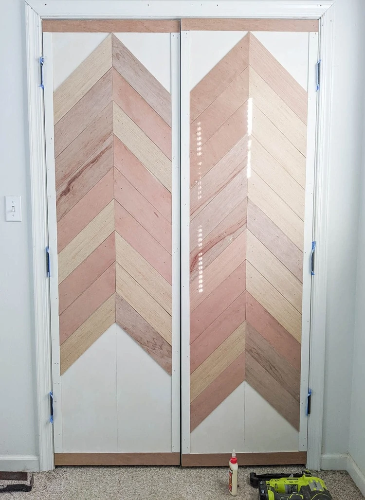 continuing the chevron wood planks down the door.