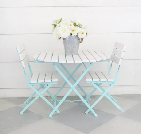 small patio table and chairs painted aqua and white.
