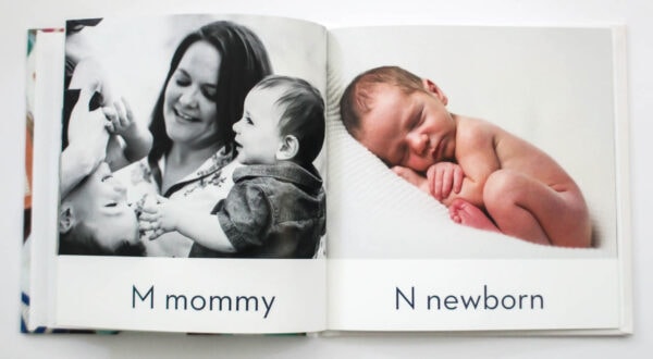 abc photo book layout with m for mommy and n for newborn.