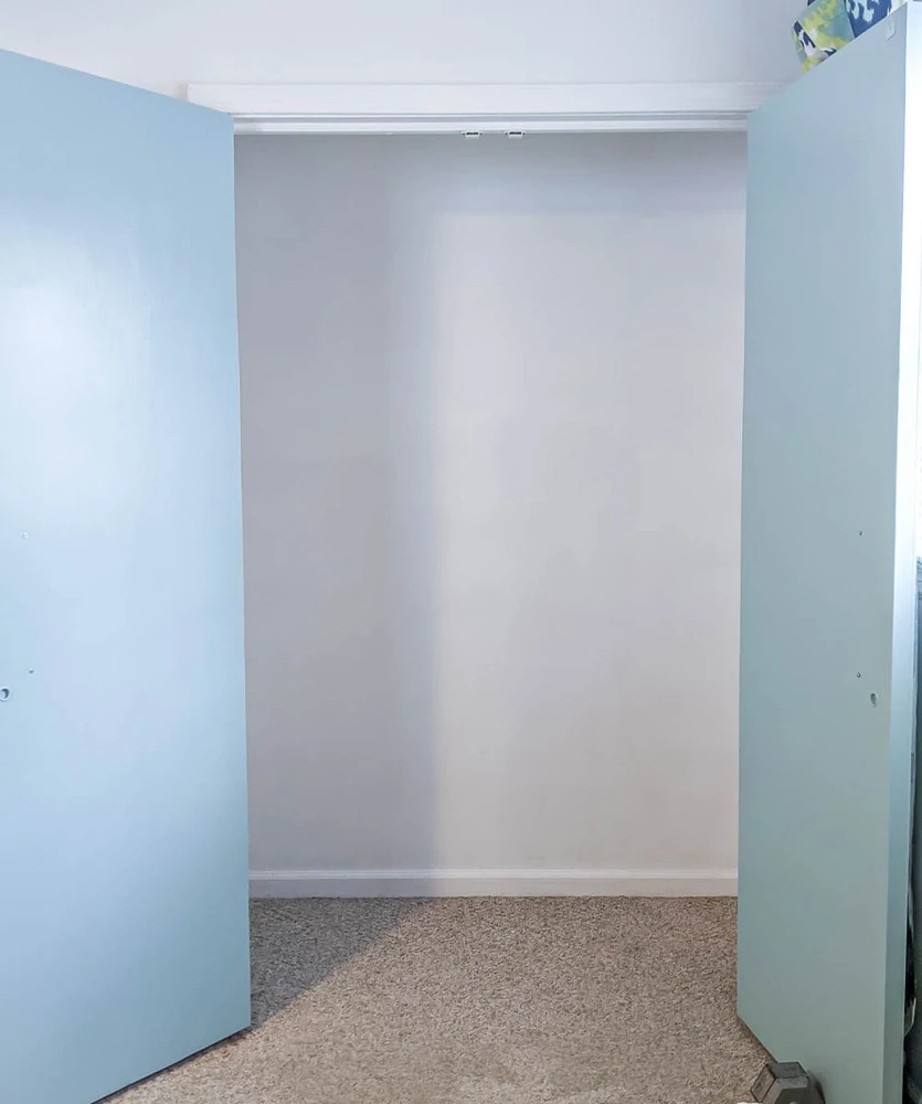 empty closet with fresh coat of white paint.