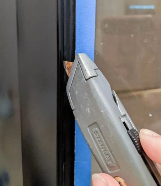 running a utility knife along the edge of painter's tape before removing it.