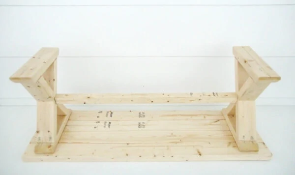 diy wood bench upside down to show underneath construction.